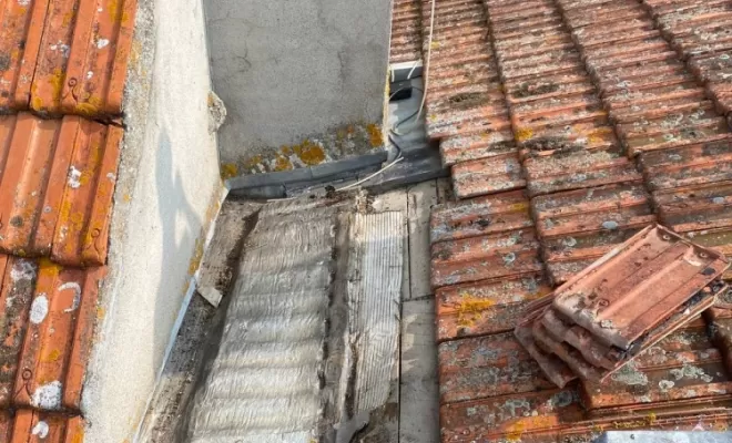 Dépose de l'ancien abergment de cheminée à Chaptuzat.