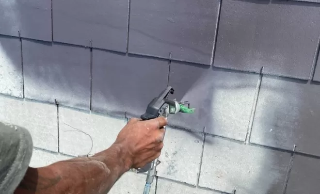 Passage d'une peinture thermicolors sur une toiture à Besse.