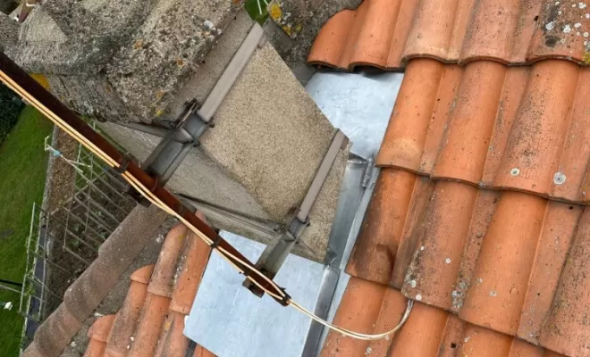 Abergement de cheminée en zinc sur mesure à Prémilhat.