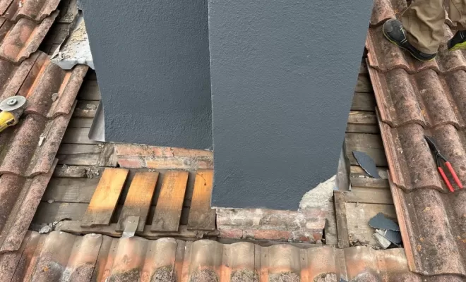 Abergement de cheminée en zinc sur mesure à Clermont-Ferrand.