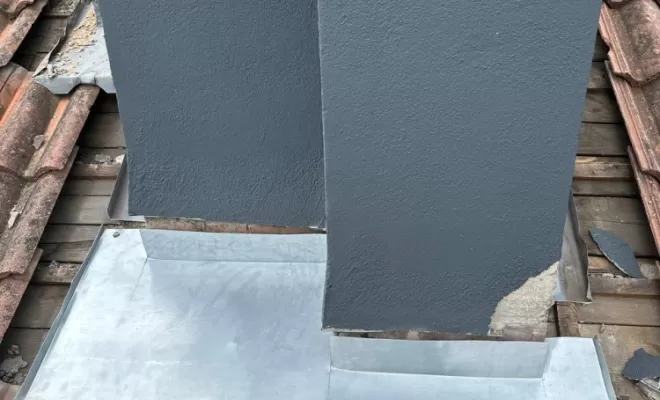 Abergement de cheminée en zinc sur mesure à Clermont-Ferrand.