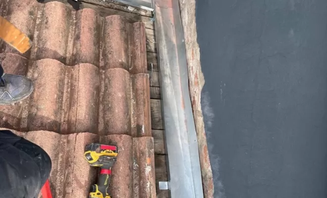 Abergement de cheminée en zinc sur mesure à Clermont-Ferrand.