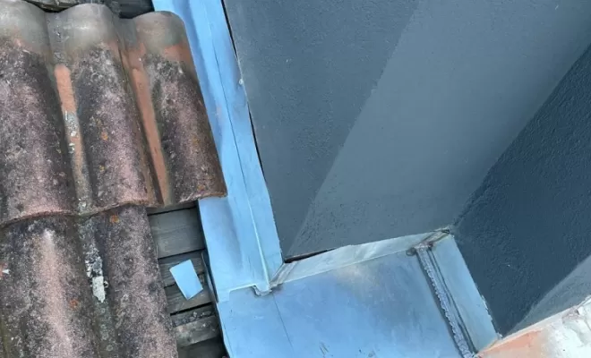 Abergement de cheminée en zinc sur mesure à Clermont-Ferrand.