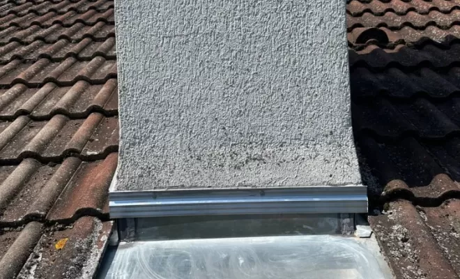 Abergement de cheminée en zinc sur mesure à Montluçon.