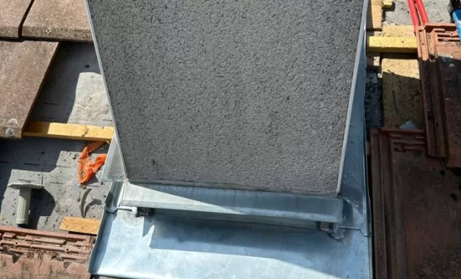 Abergement de cheminée en zinc sur mesure à Ambert. 