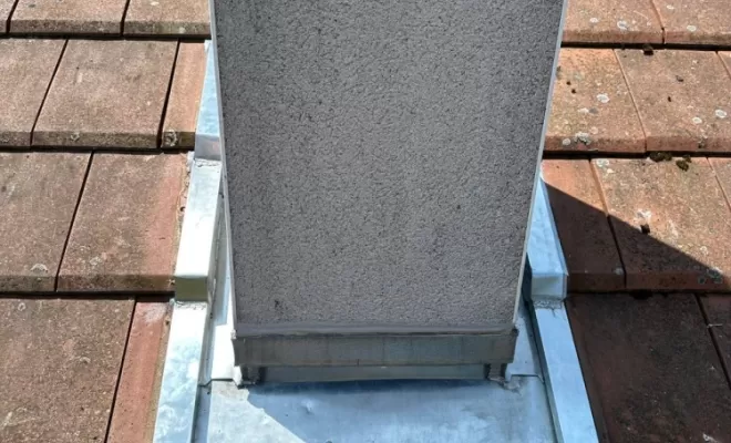 Abergement de cheminée en zinc sur mesure à Ambert.