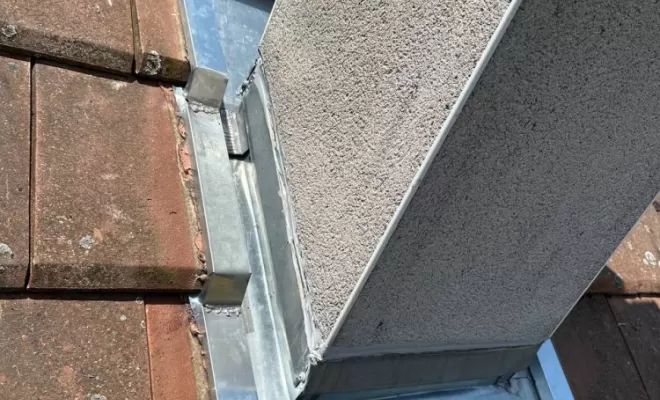 Abergement de cheminée en zinc sur mesure à Ambert.